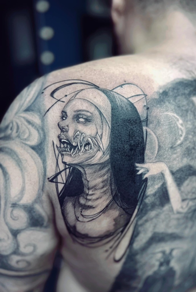 Black and grey realism tattoo