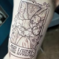 Fine line floral tattoo